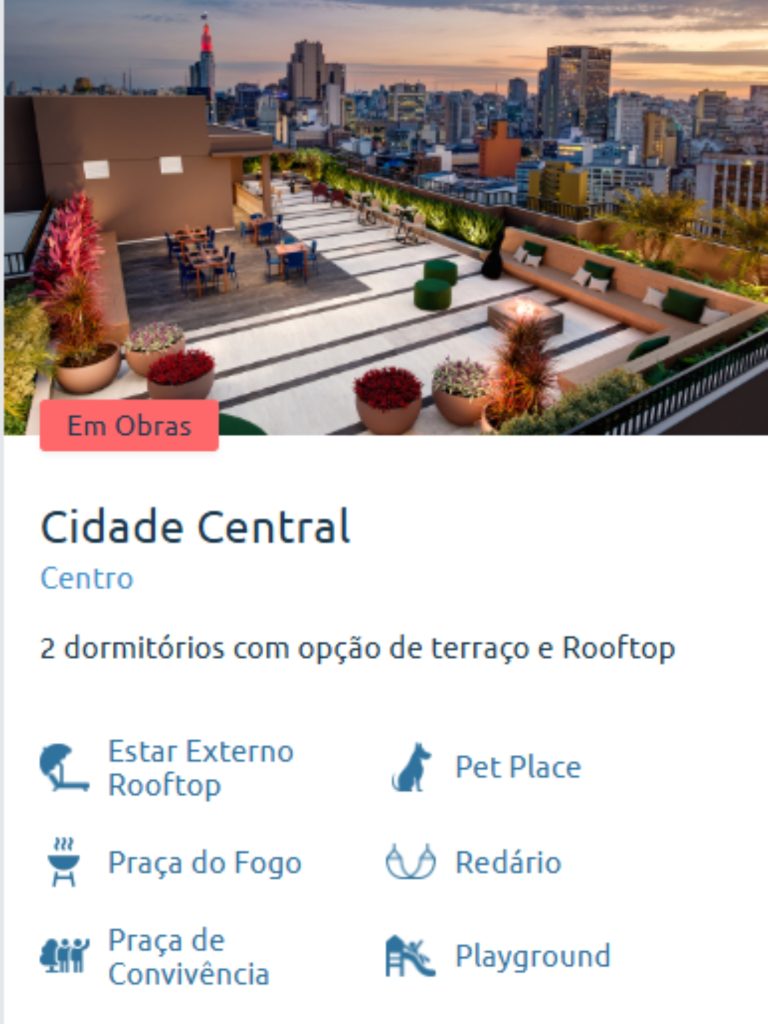 Rooftop do Cidade Central com vista para o centro de São Paulo e área de convivência moderna e aconchegante.