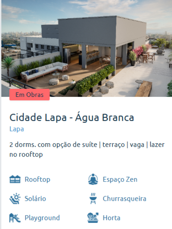 Rooftop do Cidade Lapa – Água Branca com área de convivência, sofás, mesas e vista panorâmica da cidade ao pôr do sol.