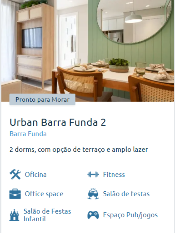 Sala de jantar decorada do Urban Barra Funda 2, com espelho redondo e ambiente moderno e aconchegante.